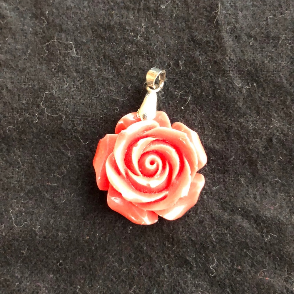 Carved rose pendant